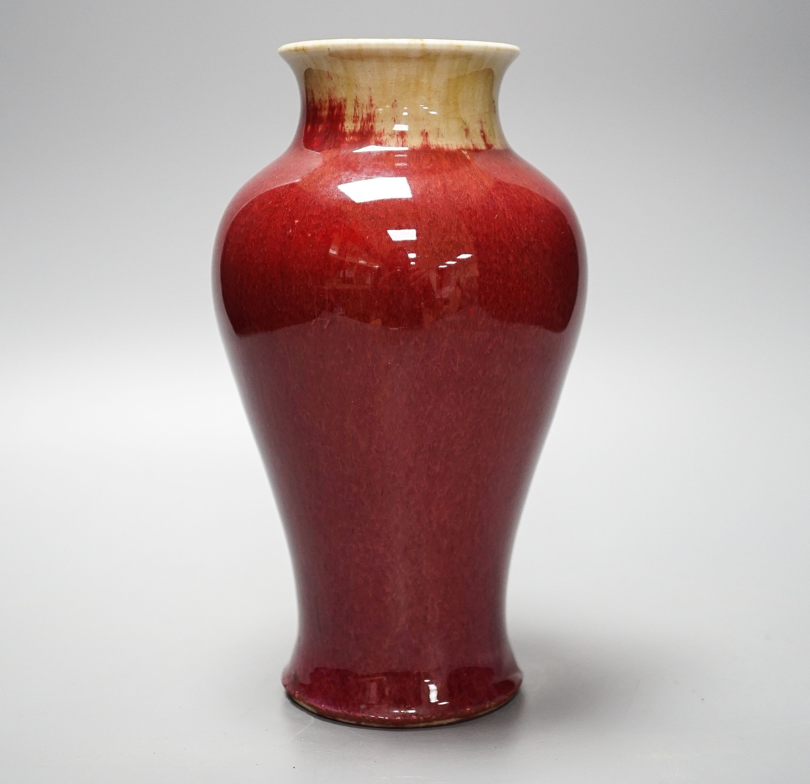 A Chinese sang de boeuf glazed vase 22cm